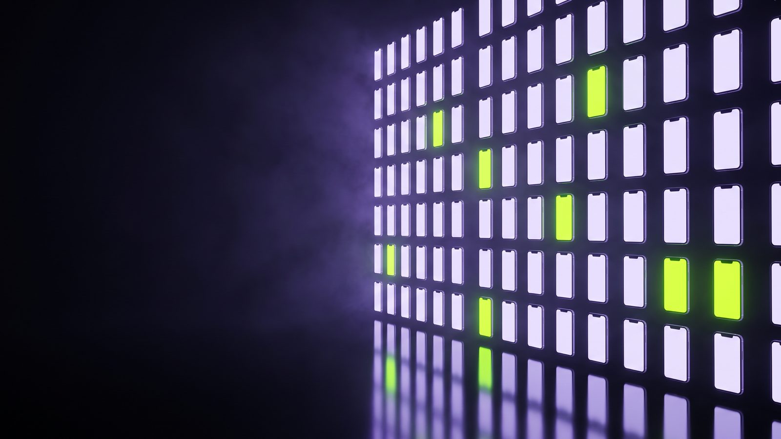 Rows of glass panels shaped like phones glowing in the dark, a few lit bright green, an abstract picture of studying which live ads win.