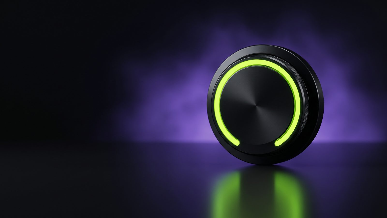 A black control dial on a dark desk with its outer ring glowing green, like a budget being turned up.