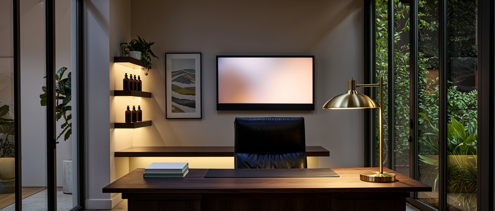 Unoccupied modern office with a desk, a lamp and a monitor showing nothing, concept render by PELORA