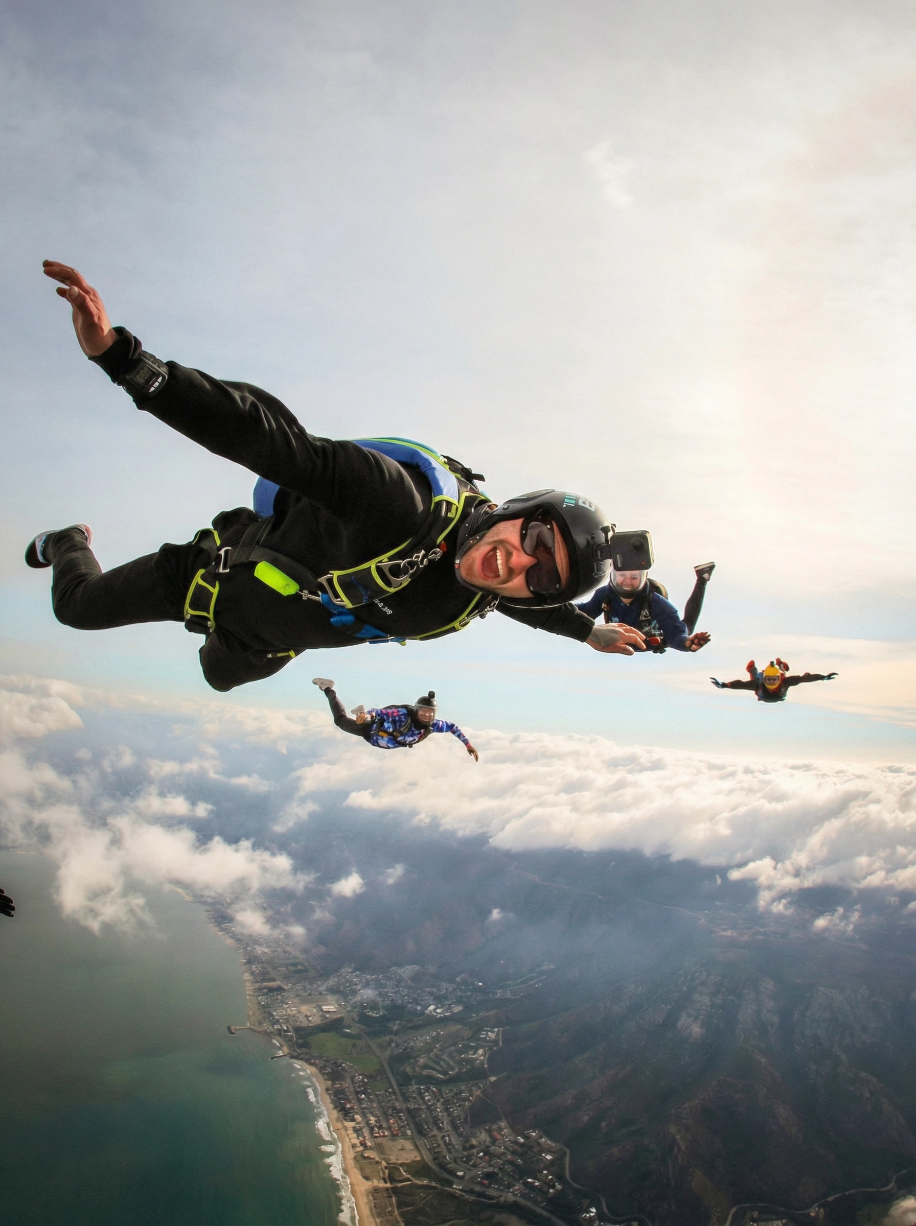 Preston Durnford skydiving over Newport Beach, California — founder of PELORA Marketing, author of The Epic Journal, behavioral health operator and 12-year sober entrepreneur