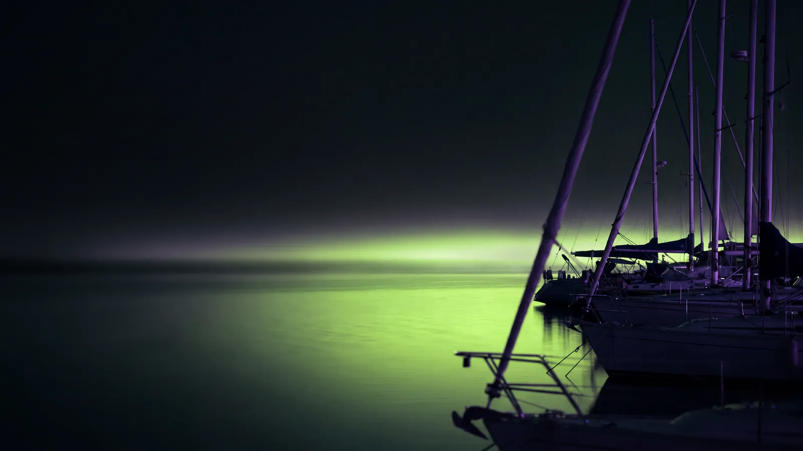 Concept render: a harbor at dusk with sailboat masts